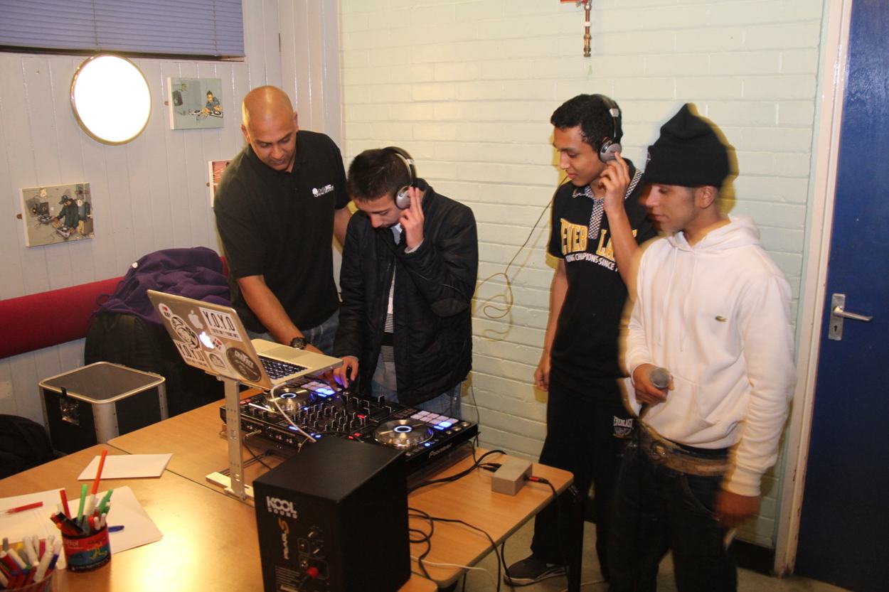 Young people taking part in a music workshop